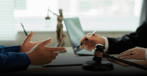 Two people discussing in a legal office.
